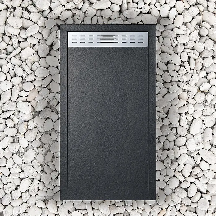 FRASCIO New Tecnology Duschwanne Duschwanne - L x B: 1.100 x 800 mm, Verbundwerkstoff, Schwarz - Dunkelgraue, strukturierte Duschwanne mit linearem Metallablaufgitter, inmitten weißer Kieselsteine.