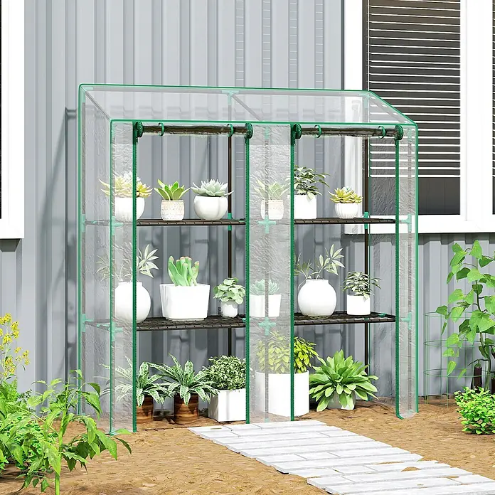 Outsunny Gewächshaus - 143 x 46 cm, Material Seitenwand: Kunststoff, 0,3 mm, Schwarz - Gartengewächshaus mit klarer Plastikabdeckung, grünem Rahmen und Regalen voller verschiedener Topfpflanzen.