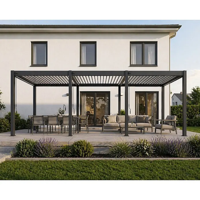 Weide Pergola Classic Pergola 3 x 9 M Anthrazit freistehend Aluminium Lamellendach - B x T: 900 x 300 cm, Aluminium - Dunkelgraue Aluminium-Pergola auf einer Betonterrasse, die einen Ess- und Loungebereich im Freien vor einem weißen Haus beschattet.