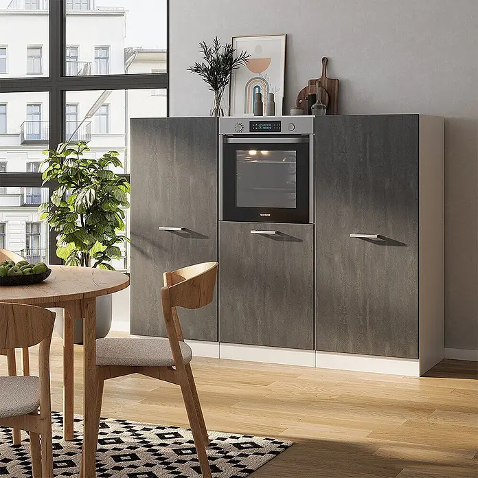 Vicco Küchenleerblock R-Line Schwarz Beton/Weiß ohne Arbeitsplatte - Schwarz Beton - Hoher Küchenschrank in dunkelgrauer Betonoptik mit weißem Sockel und integriertem Backofen, in moderner Küchenumgebung.