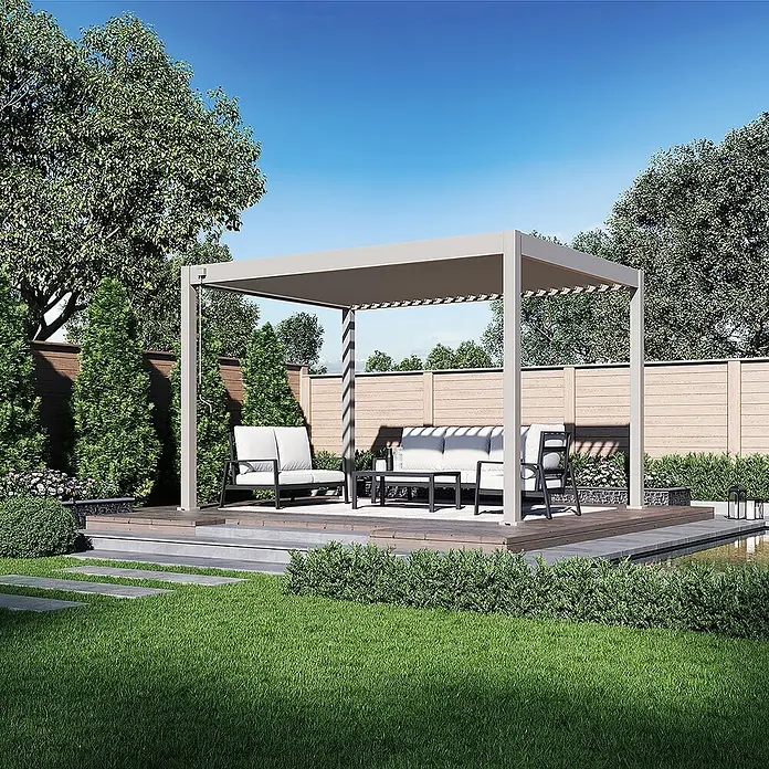 Weide Pergola Deluxe Plus freistehend Aluminium 3 x 4 m Ivory-Sand - B x T: 400 x 300 cm, Farbe Gestell: Sandpapier FinishIvory Sand / RAL Farbcode 7024, Aluminium - Graue Metall-Pergola, die eine Outdoor-Sitzgruppe mit Loungemöbeln auf einer Terrasse überdacht.