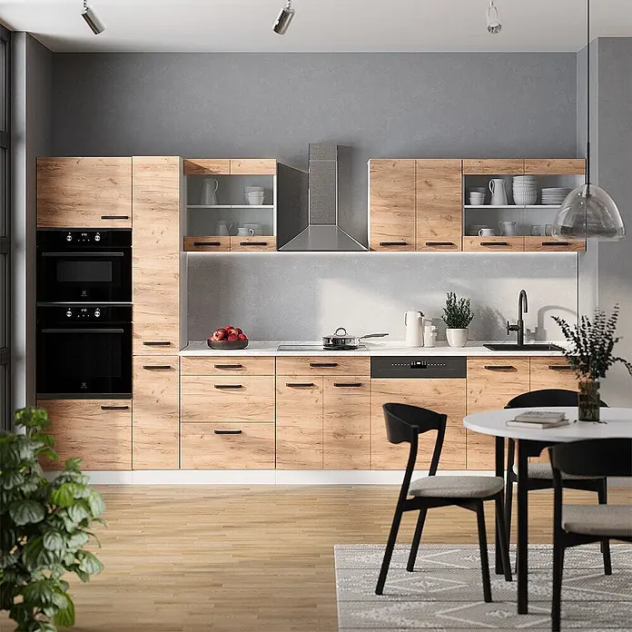 Vicco Küchenzeile R-Line Goldkraft Eiche/Weiß AP Eiche - Goldkraft Eiche, Ohne Elektrogeräte - Moderne Küche mit hellen Holzschränken, schwarzen Griffen, integrierten Öfen, Geschirrspüler und Esstisch.