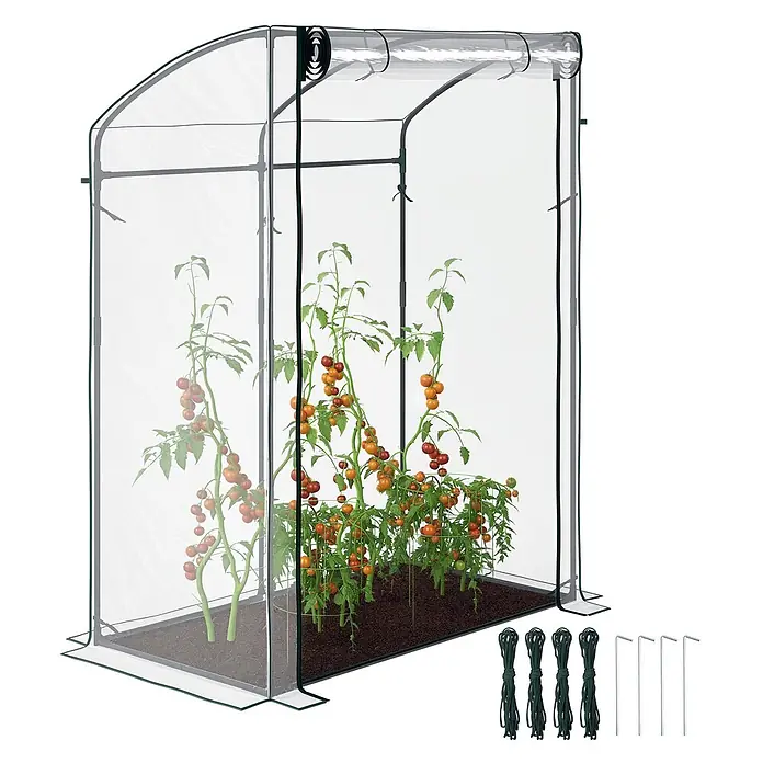 Outsunny Gewächshaus - 128 x 70 cm, Material Seitenwand: Kunststoff, 0,3 mm, Grün - Kleines, tragbares Gewächshaus mit transparenter Abdeckung und dunkelgrünem Rahmen, gefüllt mit Tomatenpflanzen. Inklusive Seilen und Erdankern.