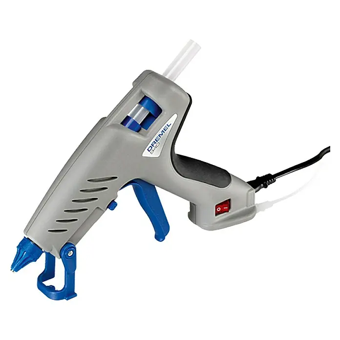 Dremel Heißklebepistole 940-3 - Durchmesser Klebepatrone: 11 mm - 12 mm, Aufheizzeit: 5 min - 7 min, Arbeitstemperatur: 195 °C - Das Bild zeigt eine Dremel 940 Heißklebepistole, ein Werkzeug zum Auftragen von Schmelzklebstoff für verschiedene Bastel- und Reparaturarbeiten.