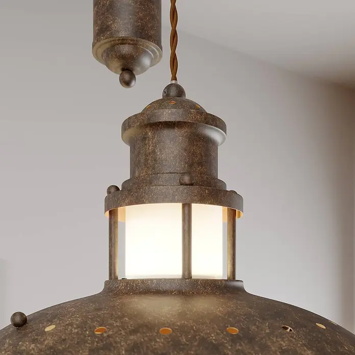 Lindby Pendelleuchte Louisanne - braun / rost, braun, klar, satiniert, E27 - Industrielle Pendelleuchte mit gealterter Bronzefinish und leuchtendem Glasdiffusor, an einem geflochtenen Kabel hängend.