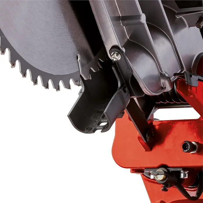 Einhell Kapp- & Gehrungssäge TC-SM 2131/1 Dual - 1.800 W, Durchmesser Sägeblatt: 210 mm, Leerlaufdrehzahl: 4.900 U/min - Nahaufnahme eines Kreissägeblatts, schwarzer Schutzhaube und orangefarbenem Gerätegehäuse.