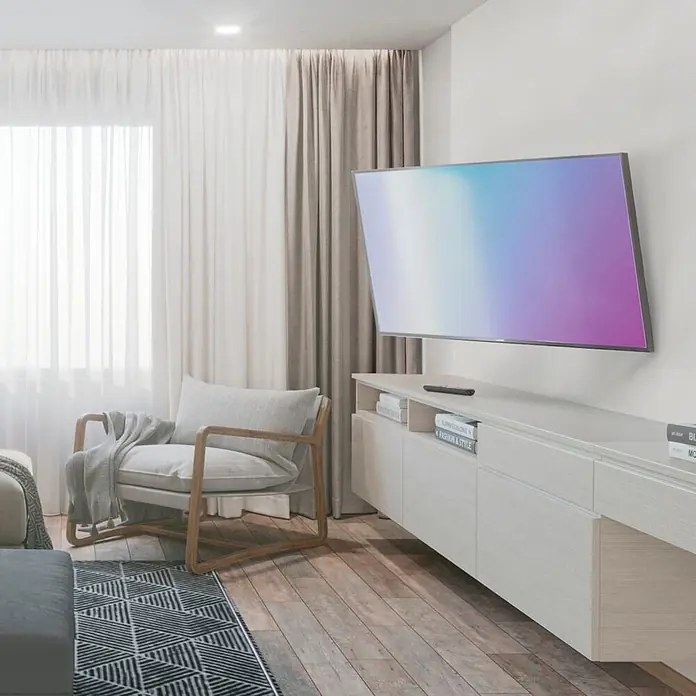 Hama TV-Wandhalterung 813 cm (32") - 2159 cm - 85" - Modernes, helles Holz, schwebendes TV-Sideboard mit Stauraumfächern in einem Wohnzimmer, das einen Fernseher und Bücher trägt.