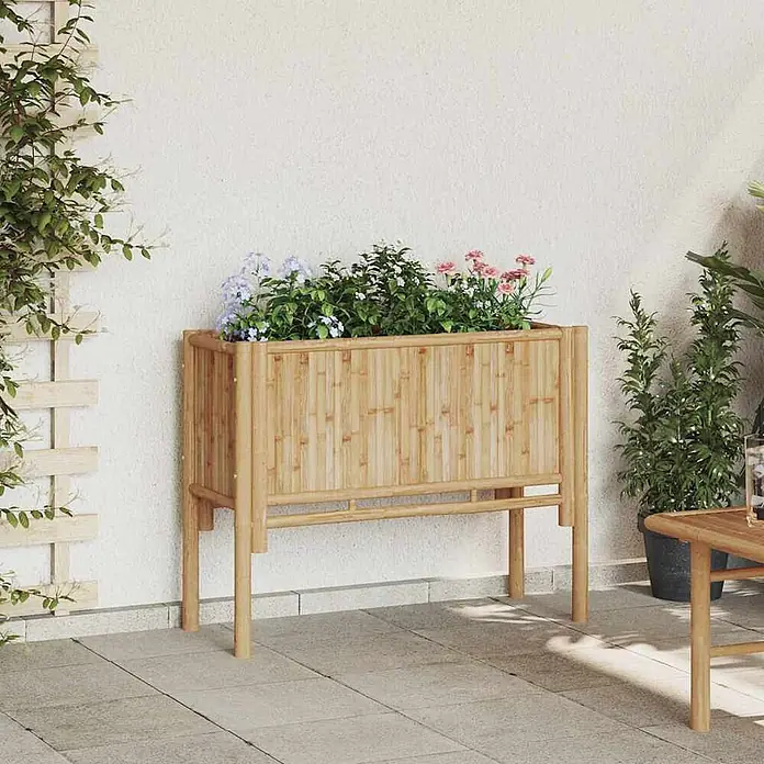 Furnicato Hochbeet - 90 x 35 x 70 cm, Naturmaterialien, Braun - Natürliches Bambus-Hochbeet, mit bunten Blumen gefüllt.