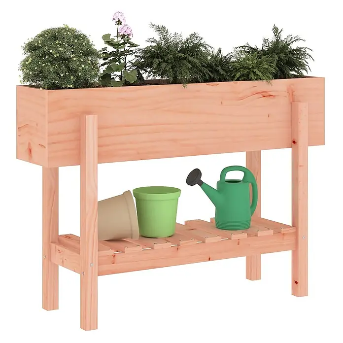 Furnicato Hochbeet - 30 x 101 x 69 cm, Holz, Natürliches Douglasie - Hölzernes Hochbeet mit einer Lattenablage, bepflanzt und mit Gartengeräten wie Töpfen und einer Gießkanne.