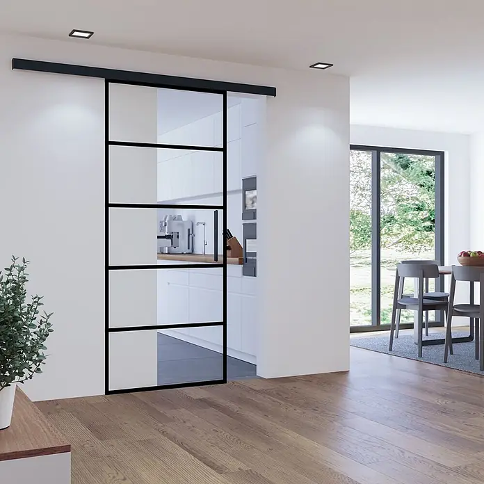 Inova Glasschiebetür Loft Komplettset 880 x 2035 mm 5 Felder mit Softclose -  - Schwarz gerahmte Glasschiebetür als Trennwand in einem modernen Küchenbereich.