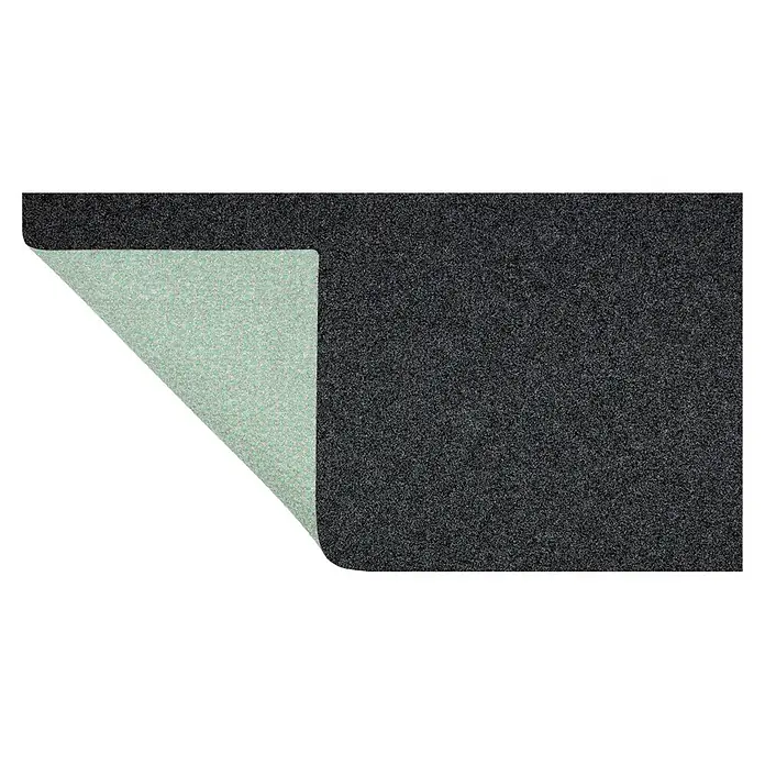 Rasenteppich Park - L x B: 100 x 100 cm, Anthrazit, Mit Drainagenoppen - Dunkelgraue Matte, eine Ecke hochgeklappt, zeigt eine hellgrüne, gepunktete Antirutschunterlage.