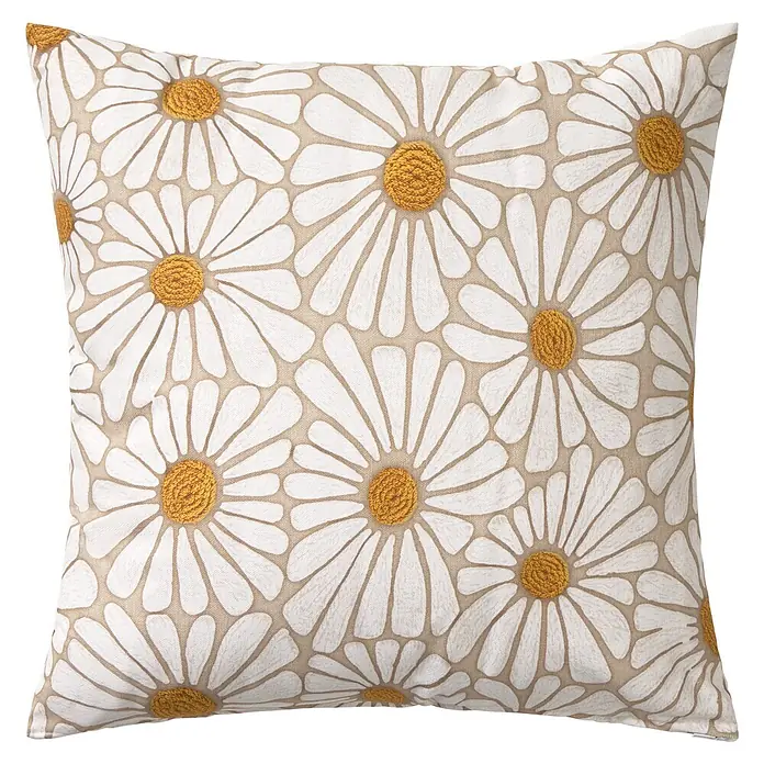 Cojín Margarita bordado - 30 x 50 cm, Textil, Blanco, Rectangular - Cojín cuadrado con patrón de margaritas bordadas blancas y centros amarillos sobre tela beige.