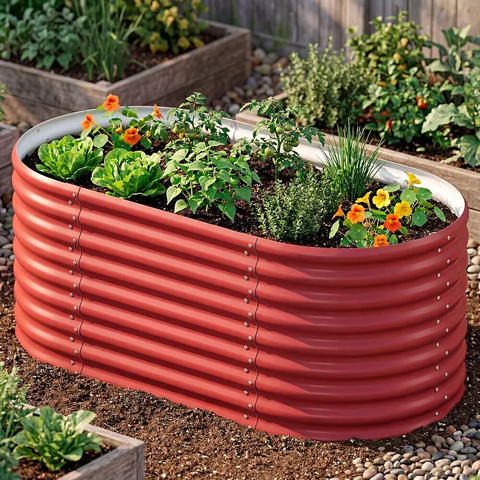 Vitavia Hochbeet Terra 630 - 162 x 82 x 63 cm, Zincalume®, Rubin - Rotes, ovales Hochbeet aus Wellblech mit Pflanzen im Garten.