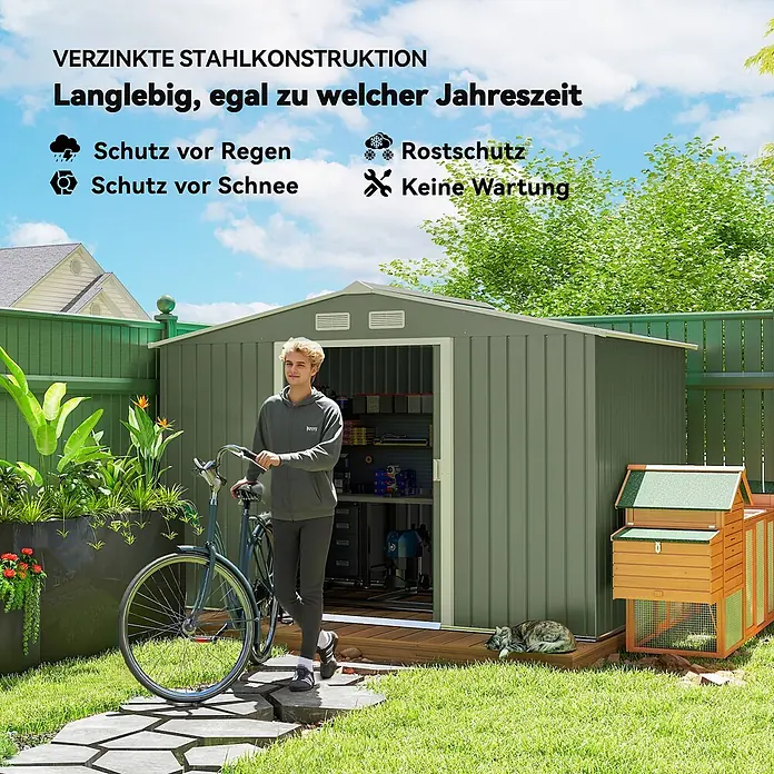 Outsunny Gerätehaus - Außenbreite inkl. Dachüberstand: 277 cm, Außentiefe inkl. Dachüberstand: 195 cm, Stahl, Hellgrün - Ein grüner verzinkter Stahl-Gartenschuppen in einem sonnigen Garten, mit einer Person und einem Fahrrad am offenen Eingang.