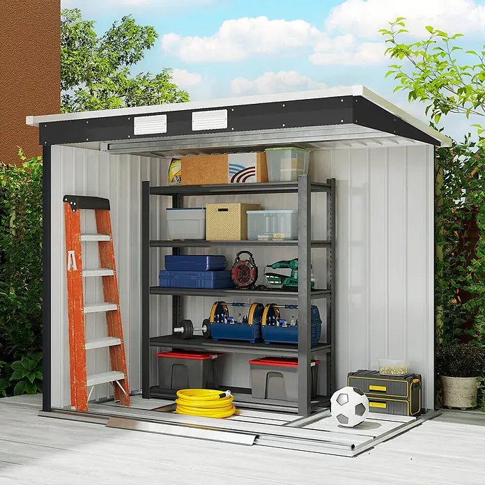 Outsunny Gerätehaus - Außenbreite inkl. Dachüberstand: 213 cm, Außentiefe inkl. Dachüberstand: 130 cm, Stahl, Dunkelgrau - Weiß-schwarzer Metall-Gartenschuppen mit Schiebetüren, gefüllt mit Werkzeugen und Gartenartikeln.