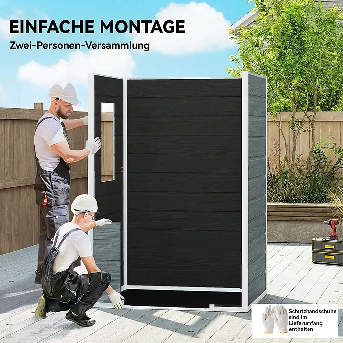 Outsunny Gerätehaus - Außenbreite inkl. Dachüberstand: 128 cm, Außentiefe inkl. Dachüberstand: 104 cm, Aluminium, Grau - Zwei Personen montieren einen dunkelgrauen Gartenschuppen mit weißem Rahmen auf einer Holzterrasse.