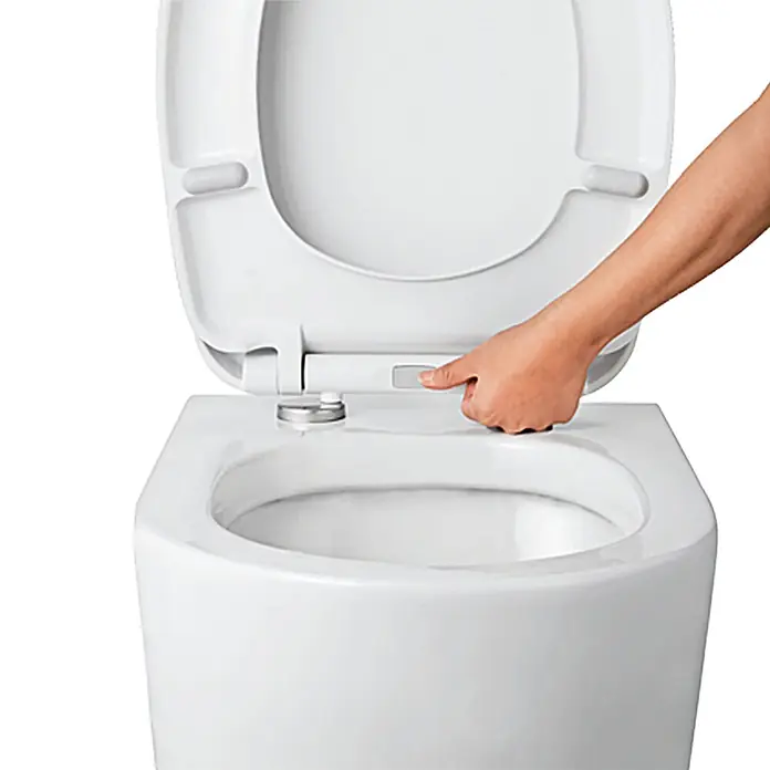 WC-Sitz Siracusa - Duroplast, Weiß, Mit Absenkautomatik - Ein Händedruckknopf an einem weißen WC-Sitz.