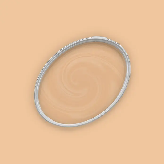 Tadessi Wandfarbe Pfirsichbeige - Beige, Matt, 5 l - Klarer ovaler Behälterdeckel mit grauem Rand, der verwirbelten cremigen Inhalt zeigt.