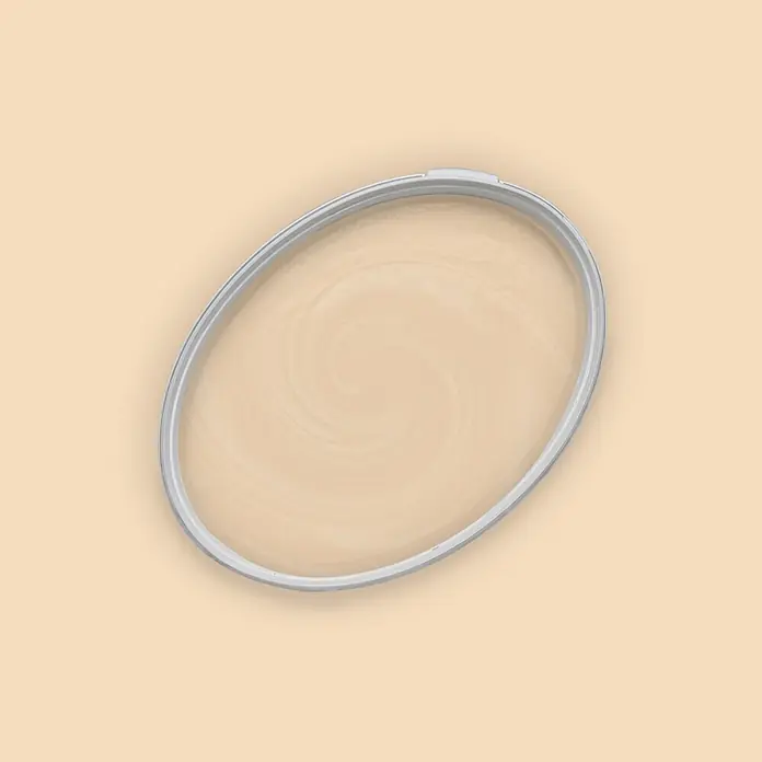 Tadessi Wandfarbe Honigbeige - Beige, Matt, 5 l - Grauer ovaler Stickrahmen mit hellbeigem, wirbelndem Stoff im Inneren.