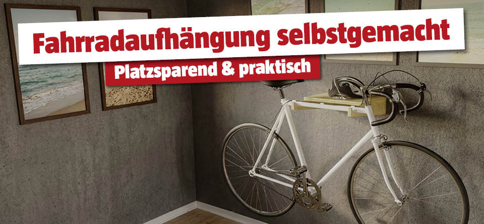 Selbstgemachte Fahrradaufhängung aus Holz an der Wand