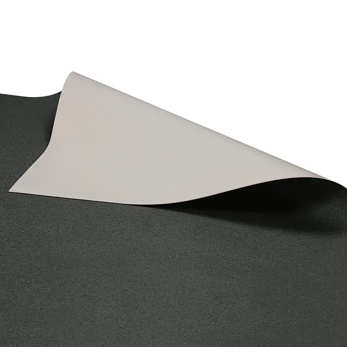 Vinylboden CV-Belag - 1.400 x 100 cm, Mira 990D - Dunkelgraue, texturierte Matte, deren Ecke umgeklappt ist und eine glatte, hellgraue Unterseite zeigt.