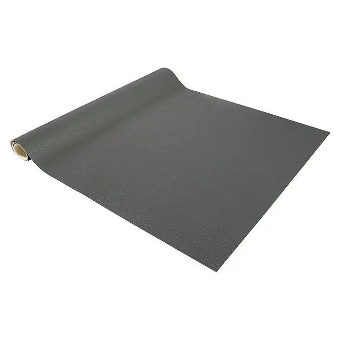 Vinylboden CV-Belag - 500 x 200 cm, Anthrazit, Fairplay - Teilweise ausgerollte dunkelgraue Matte mit kreisförmiger Textur.