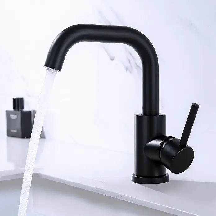 LOMAZOO Waschtischarmatur QR-C9UY-MN5T - Schwarz - Mattschwarzer Einhebel-Waschtischarmatur mit Wasserstrahl in ein weißes Waschbecken.