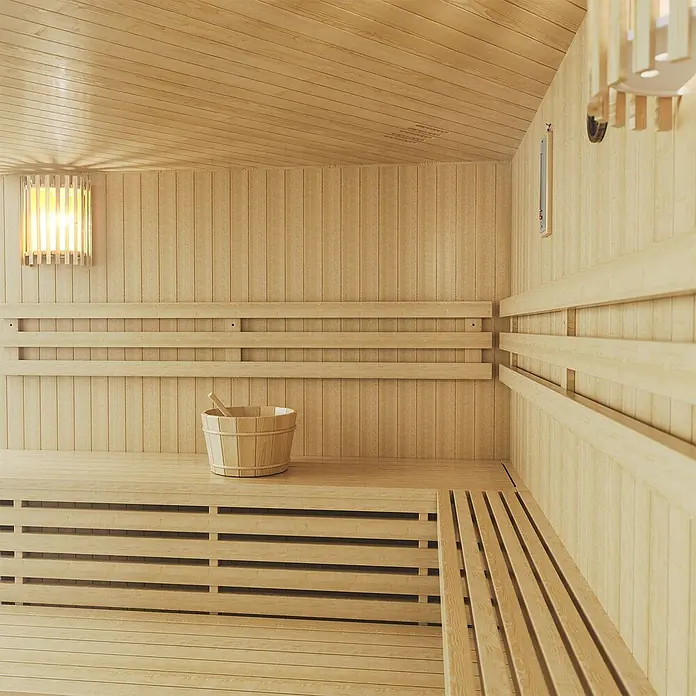 Artsauna Elementsauna Espoo - L x B x H: 200 x 200 x 200 cm - Leerer Saunainnenraum aus hellem Holz mit Bänken, einem Holzeimer und gedämpfter Beleuchtung.