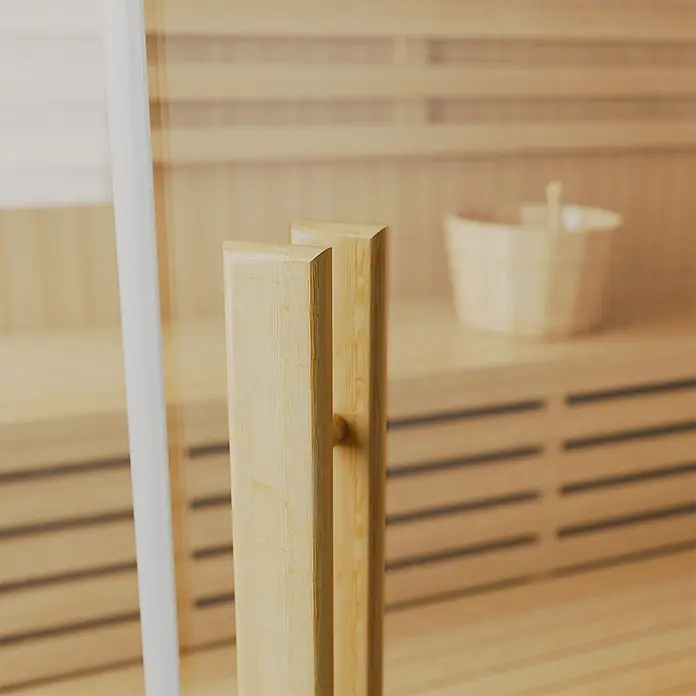 Artsauna Elementsauna Espoo - L x B x H: 200 x 200 x 200 cm - Heller Saunatürgriff aus Holz mit verschwommenem Saunainterieur, Bänken und Holzeimer.
