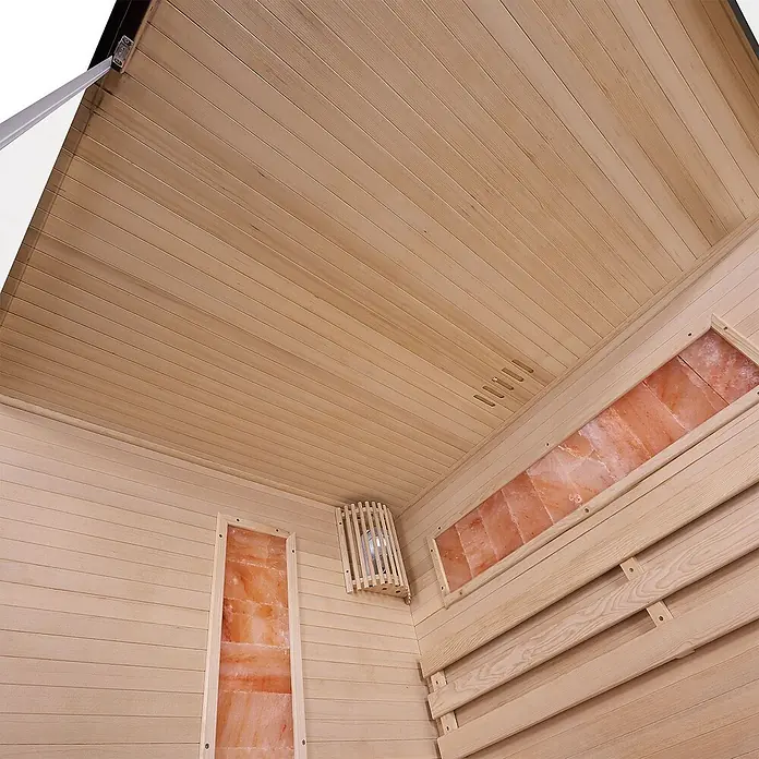 Artsauna Elementsauna Vantaa - L x B x H: 140 x 175 x 200 cm - Innenansicht einer hellen Holzsauna mit integrierten leuchtenden Himalaya-Salzpaneelen und Holzleuchte.