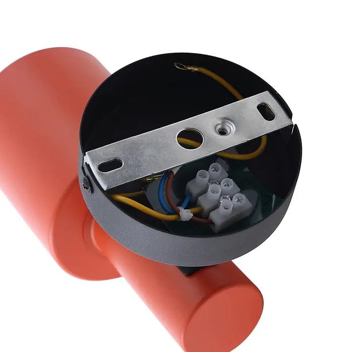 Lindby Wandstrahler Ovelia - schwarz, gelb / orange, E27 - Orange zylindrische Lampe mit Innenverkabelung, Klemmenblöcken und einer Metallhalterung zur Installation.