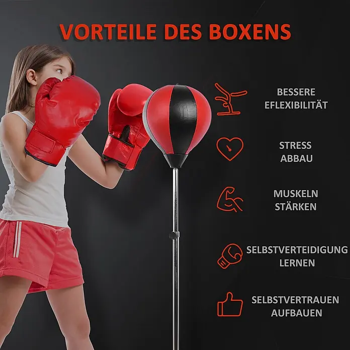 Homcom Boxsack - Rot - Ein Kind in roten Boxhandschuhen steht neben einem rot-schwarzen Standboxsack und demonstriert dessen Nutzung.