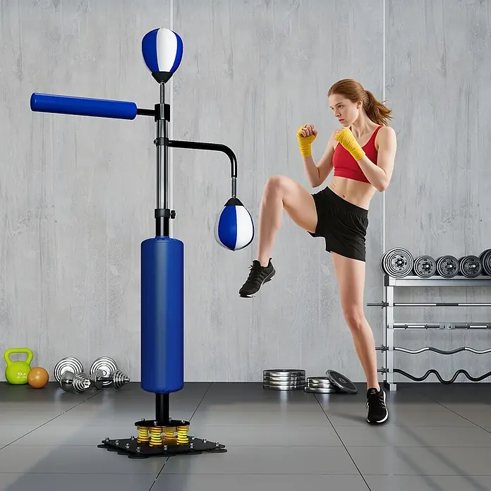 Sportnow Boxsack - Blau - Frau trainiert mit blau-weißer freistehender Box- & Speedbag-Station.