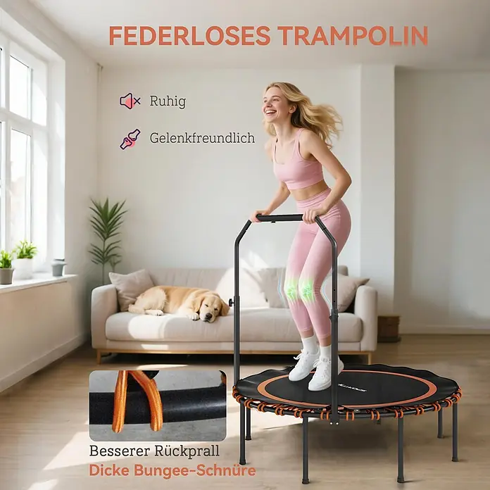 Sportnow Rebounder - Stahl, Schwarz, Orange - Eine Frau springt auf einem schwarzen, federlosen Trampolin mit Haltegriff. Es wird als leise und gelenkschonend mit dicken Bungee-Schnüren beworben.