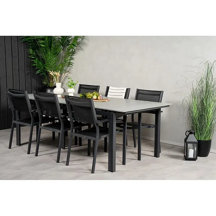 Ebuy24 Gartentisch-Set Levels - Gesamtumfang: 7 -tlg., L x B x H: 229 x 100 x 74 cm, Ø x H: 229 x 74 cm, Aintwood, Stapelbar - Anthrazitfarbene Outdoor-Essgruppe mit hellgrauem Tisch und schwarzen Netzstühlen für Terrasse oder Garten.