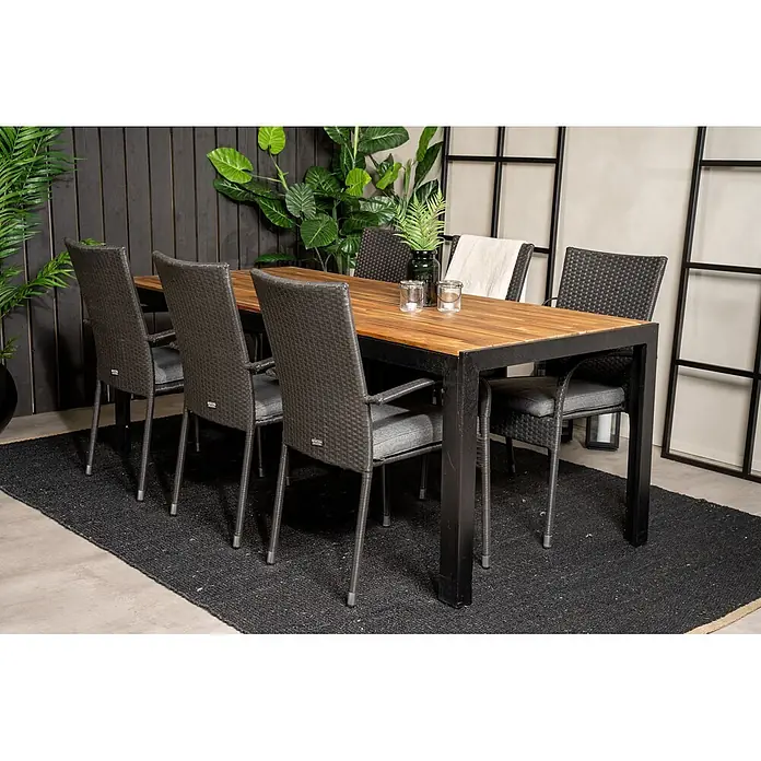 Ebuy24 Gartentisch-Set Bois - Gesamtumfang: 7 -tlg., L x B x H: 205 x 90 x 76 cm, Ø x H: 90 x 76 cm, Rattan, Stahl Akazie, Aluminium, Stapelbar - Outdoor-Esstischgruppe mit Holztischplatte und sechs dunkelgrauen Geflechtstühlen mit Kissen.