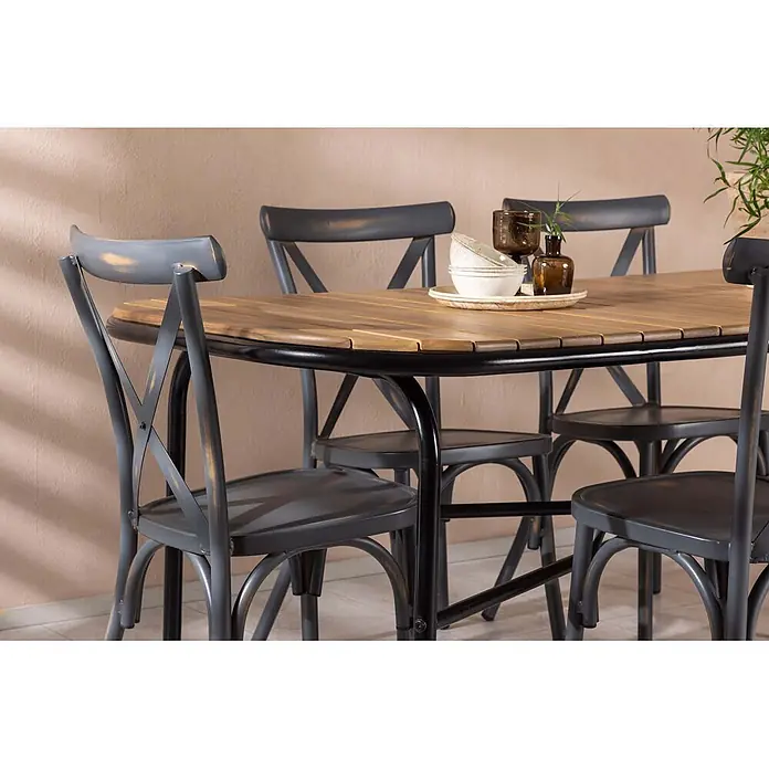 Ebuy24 Gartentisch-Set Holmbeck - Gesamtumfang: 7 -tlg., L x B x H: 90 x 200 x 75 cm, Ø x H: 90 x 75 cm, Aluminium Akazie, Stapelbar - Esstisch mit Holzplatte und schwarzem Metallgestell, kombiniert mit grauen Metallstühlen im Used-Look, innen aufgestellt.