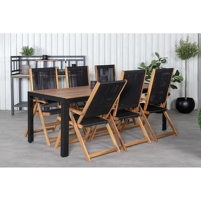 Ebuy24 Gartentisch-Set Bois - Gesamtumfang: 7 -tlg., L x B x H: 90 x 205 x 76 cm, Ø x H: 90 x 76 cm, 100 % Polyester, Akazie Akazie, Aluminium, Stapelbar - Gartenset: Holztisch mit schwarzem Metallgestell und sechs Klappstühle mit Holzrahmen und schwarzen geflochtenen Sitzflächen/Rückenlehnen.