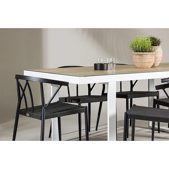 Ebuy24 Gartentisch-Set MerloStina - Gesamtumfang: 7 -tlg., L x B x H: 90 x 200 x 75 cm, Ø x H: 90 x 75 cm, Aluminium, Stapelbar - Outdoor-Esstischgruppe mit weißem Tisch, Holzoptikplatte und schwarzen Flechtsesseln.