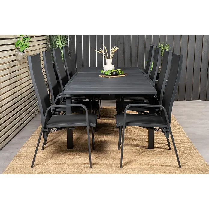 Ebuy24 Gartentisch-Set Marbella - Gesamtumfang: 9 -tlg., L x B x H: 100 x 160 x 75 cm, Ø x H: 100 x 75 cm, 30 % Polyester, 70 % PVC, Aluminium, Textil Aluminium, Stapelbar - Anthrazitfarbene Outdoor-Essgruppe mit acht Stühlen und einem Lattentisch, ideal für die Terrasse.