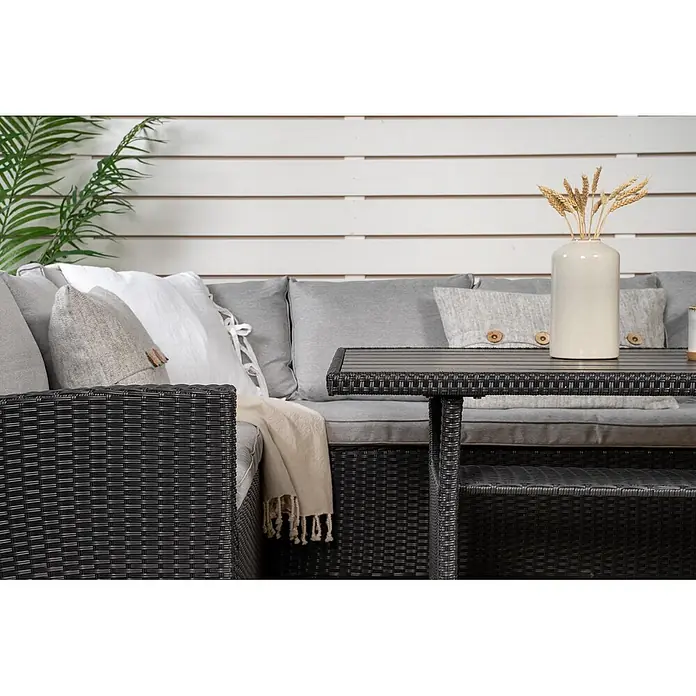 Ebuy24 Loungemöbel-Set Brentwood - 2 -tlg., Holz Korbmöbel Polyester, Schwarz - Dunkelgraues Rattan-Lounge-Set mit grauen Kissen und passendem Tisch, ideal für die Terrasse.