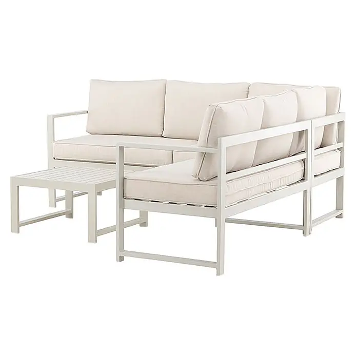 Ebuy24 Loungemöbel-Set Salvador - 2 -tlg., Aluminium, Beige - Hellesgraues Metall-Outdoor-Ecksofa mit neutralen Kissen und passendem Couchtisch.