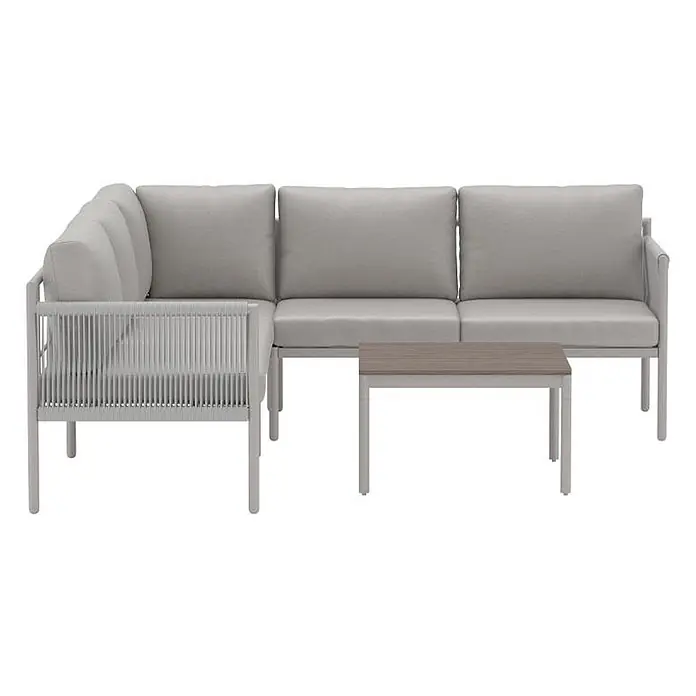 Ebuy24 Loungemöbel-Set Kos - 2 -tlg., Nonwood, Beige - Helles graues L-förmiges Outdoor-Sofa mit geflochtenen Details, passenden Kissen und einem rechteckigen Couchtisch mit Holzoptik-Platte.