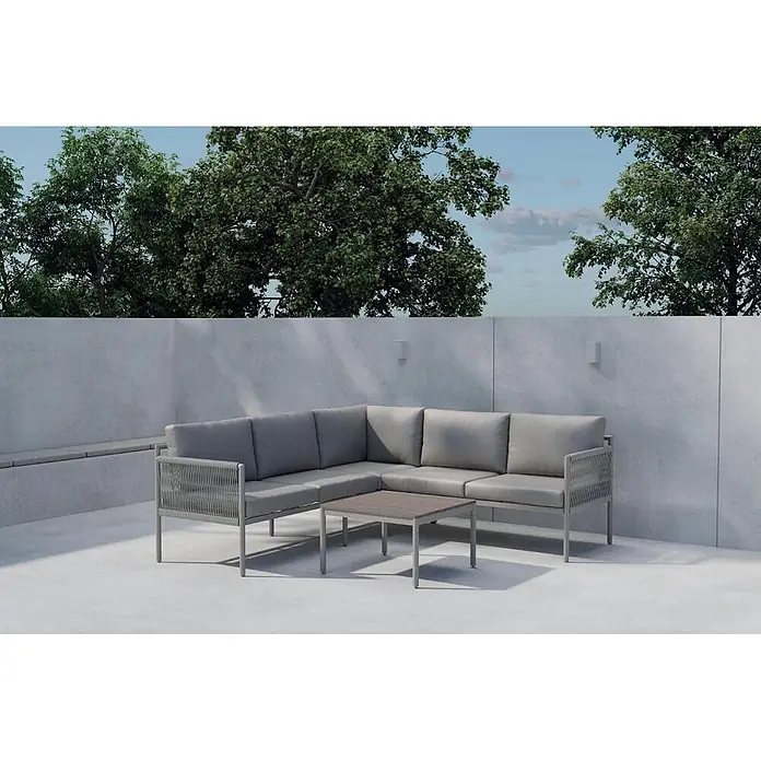 Ebuy24 Loungemöbel-Set Kos - 2 -tlg., Nonwood, Beige - Graues Outdoor-Ecksofa-Set mit passendem Couchtisch auf einer modernen Terrasse.