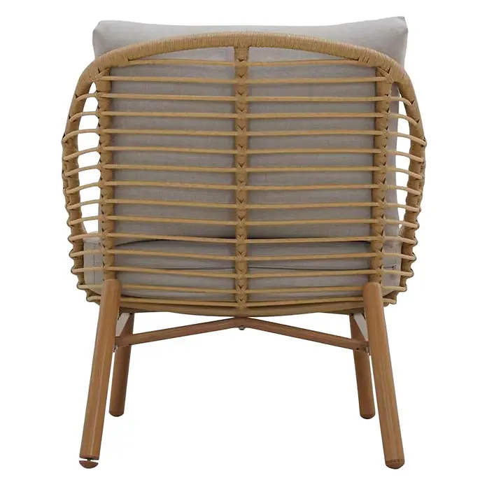 Ebuy24 Loungemöbel-Set Frederikke - 3 -tlg., Aluminium, Nonwood, Polyester, Rattan, Natur - Rückseite eines natürlichen Rattansessels mit hellgrauem Kissen.