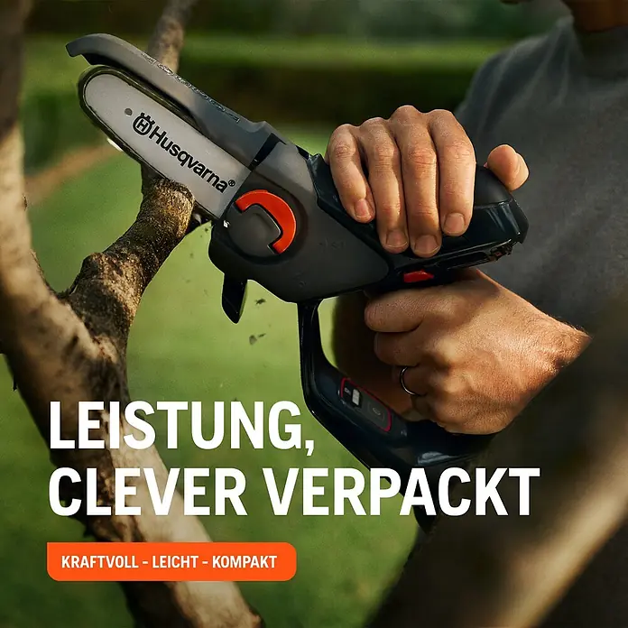 Husqvarna Akku-Kettensäge Aspire P5-P4A - 18 V, 2,5 Ah, Li-Ionen, 1 Akku, Schwertlänge: 12 cm - Eine Person schneidet mit einer dunkelgrauen Husqvarna Mini-Kettensäge mit orangefarbenem Abzug einen Ast.