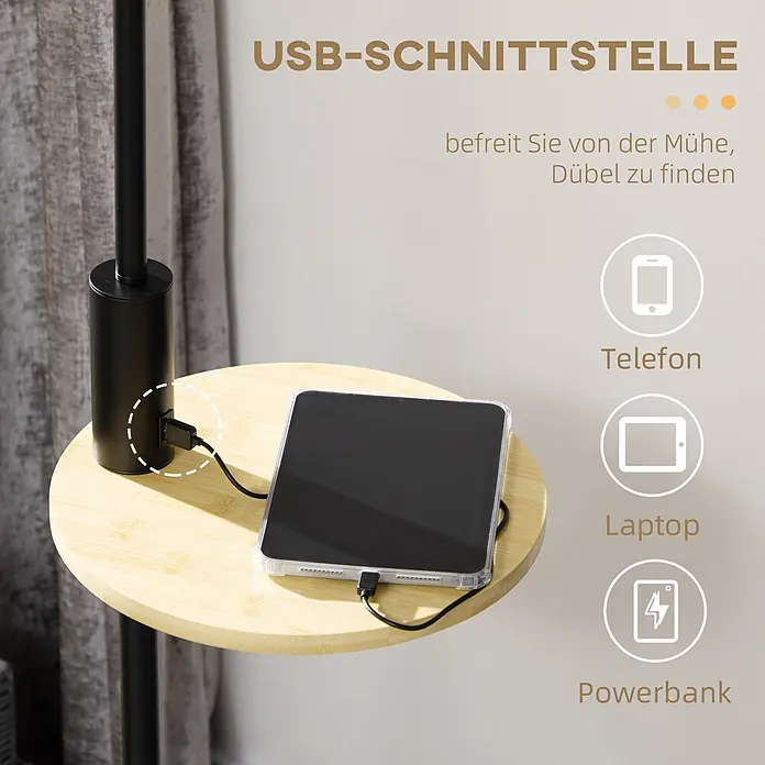 Homcom Stehleuchte - 40 W, Höhe: 170 cm, Schwarz, Weiß, E27 - Schwarze Stehlampe mit heller Bambusablage und USB-Ladeanschluss, auf der ein Tablet geladen wird.