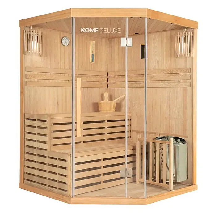 Home Deluxe Elementsauna SKYLINE XL - Elektroofen, Steuerung Ofen: Integriert - Ecksauna aus hellem Holz von HOME DELUXE mit Glastür, Innenbänken, Thermometer und Ofen mit Schutzgitter.