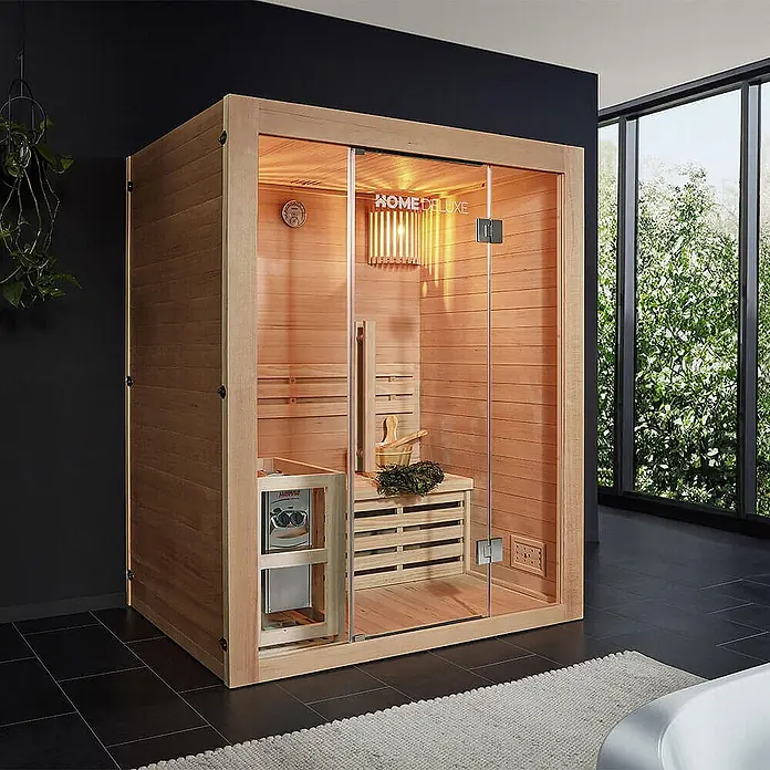 HOME DELUXE - Traditionelle Sauna SKYLINE L - 150 x 120 cm für 3 Personen -  - Saunakabine aus hellem Holz mit Glastür, Heizung und Bänken.