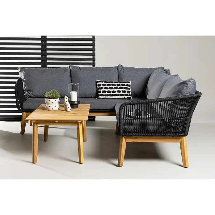 Ebuy24 Loungemöbel-Set Chania - 2 -tlg., Akazie, Schwarz - Ecksofa für den Außenbereich mit dunkelgrauen Kissen, schwarzem Geflecht und Holztisch.